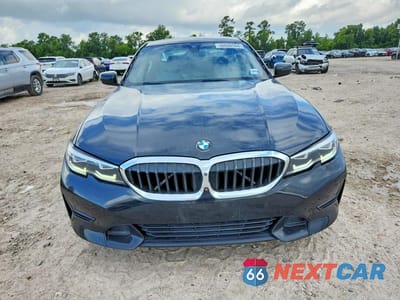 Piąte zdjęcie samochodu w środku: 2021 BMW 330I VIN:3MW5R1J03M8C16188 - miniatura