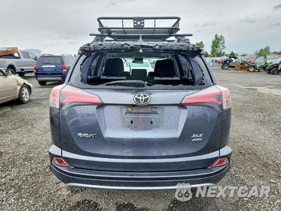 Zdjęcie 6 z 13 samochodu: 2018 TOYOTA RAV4 XLE VIN:JTMRFREV1JD226461 - miniatura