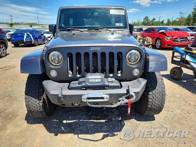 Piąte zdjęcie samochodu w środku: 2014 JEEP WRANGLER UNLIMITED SAHARA VIN:1C4HJWEG9EL240338 - miniatura