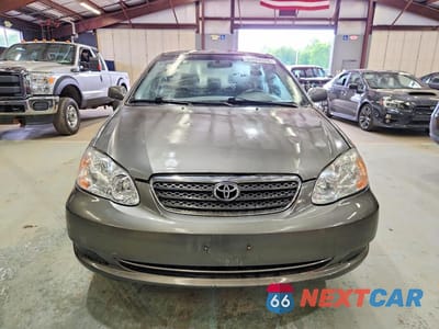 Piąte zdjęcie samochodu w środku: 2007 TOYOTA COROLLA LE VIN:2T1BR32E97C794666 - miniatura