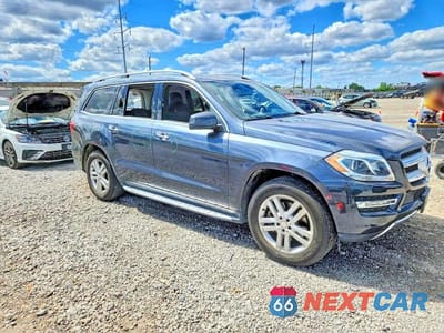 Czwarte zdjęcie samochodu z boku: 2016 MERCEDES-BENZ GL 450 4MATIC VIN:4JGDF6EE1GA624462 - miniatura