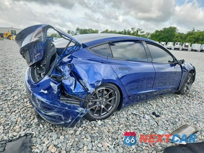 Trzecie zdjęcie samochodu z tyłu: 2021 TESLA MODEL 3 VIN:5YJ3E1EB2MF032678 - miniatura