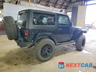 Trzecie zdjęcie samochodu z tyłu: 2018 JEEP WRANGLER SAHARA VIN:1C4AJWBG7JL859732 - miniatura