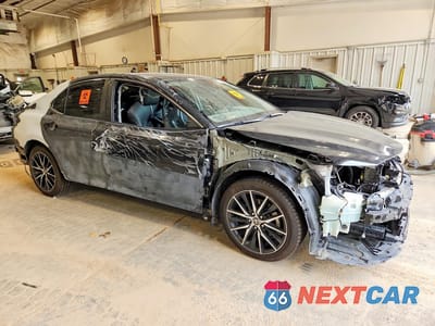 Czwarte zdjęcie samochodu z boku: 2023 TOYOTA CAMRY SE VIN:4T1T11AK4PU785122 - miniatura