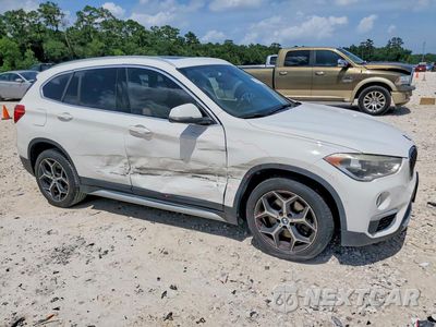 Czwarte zdjęcie samochodu z boku: 2017 BMW X1 SDRIVE28I VIN:WBXHU7C31H5H35483 - miniatura
