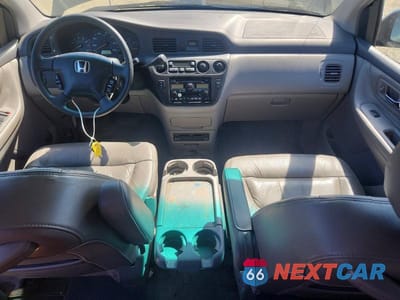 Zdjęcie 8 z 13 samochodu: 2004 HONDA ODYSSEY EXL VIN:5FNRL18024B117871 - miniatura