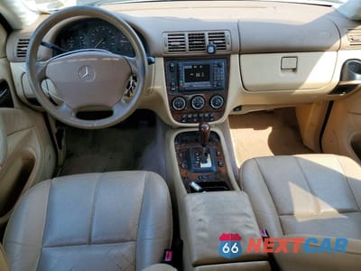 Zdjęcie 8 z 13 samochodu: 2002 MERCEDES-BENZ ML 500 VIN:4JGAB75E42A359081 - miniatura