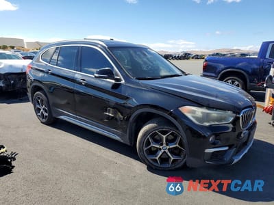 Czwarte zdjęcie samochodu z boku: 2018 BMW X1 XDRIVE28I VIN:WBXHT3C36J5K20462 - miniatura