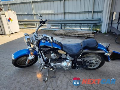Trzecie zdjęcie samochodu z tyłu: 2004 HARLEY-DAVIDSON FLSTFI VIN:1HD1BXB184Y037722 - miniatura