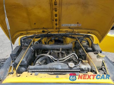 Zdjęcie 11 z 12 samochodu: 2000 JEEP WRANGLER / TJ SPORT VIN:1J4FA49S0YP738560 - miniatura