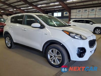 Czwarte zdjęcie samochodu z boku: 2017 KIA SPORTAGE LX VIN:KNDPMCACXH7040814 - miniatura