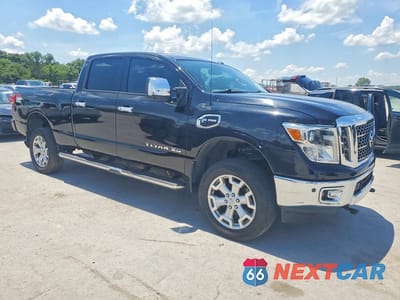 Czwarte zdjęcie samochodu z boku: 2016 NISSAN TITAN XD SL VIN:1N6BA1F4XGN514647 - miniatura