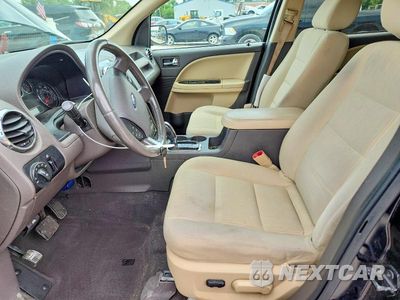 Zdjęcie 7 z 14 samochodu: 2008 FORD TAURUS X SEL VIN:1FMDK02WX8GA27413 - miniatura