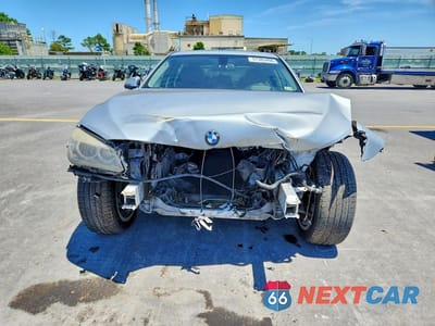 Piąte zdjęcie samochodu w środku: 2013 BMW 750 LXI VIN:WBAYF8C58DD141062 - miniatura