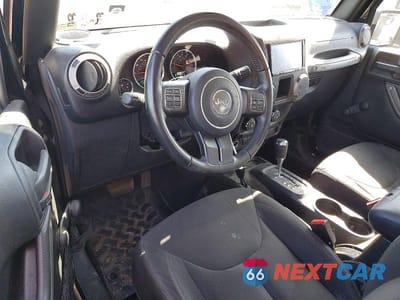Zdjęcie 8 z 12 samochodu: 2016 JEEP WRANGLER SPORT VIN:1C4AJWAG3GL327307 - miniatura