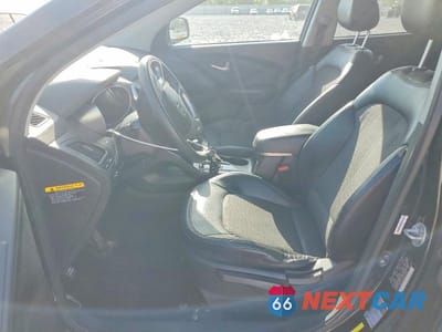 Zdjęcie 7 z 13 samochodu: 2011 HYUNDAI TUCSON GLS VIN:KM8JU3AC5BU190596 - miniatura