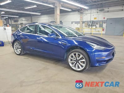 Czwarte zdjęcie samochodu z boku: 2018 TESLA MODEL 3 VIN:5YJ3E1EA0JF008155 - miniatura