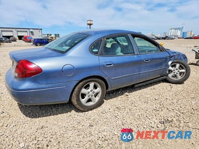 Trzecie zdjęcie samochodu z tyłu: 2000 FORD TAURUS SE VIN:1FAFP53U5YG259500 - miniatura