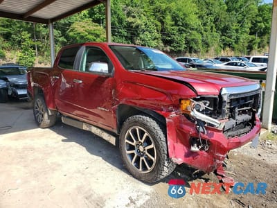 Czwarte zdjęcie samochodu z boku: 2017 GMC CANYON DENALI VIN:1GTG6EEN7H1280309 - miniatura