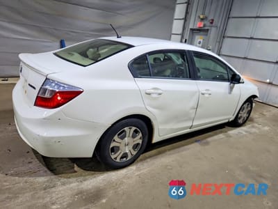 Trzecie zdjęcie samochodu z tyłu: 2012 HONDA CIVIC HYBRID VIN:JHMFB4F23CS011165 - miniatura