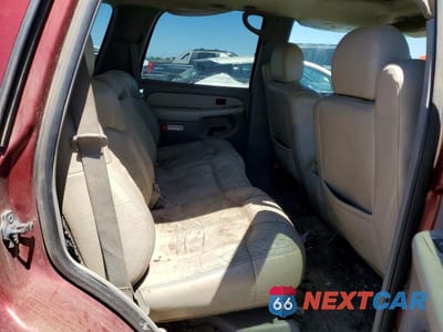Zdjęcie 11 z 13 samochodu: 2002 CHEVROLET TAHOE K1500 VIN:1GNEK13T52J266131 - miniatura