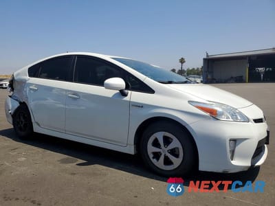 Czwarte zdjęcie samochodu z boku: 2015 TOYOTA PRIUS ONE VIN:JTDKN3DUXF0417241 - miniatura