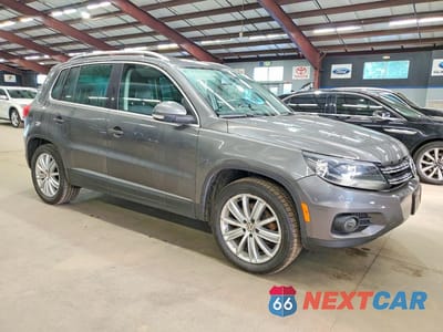 Czwarte zdjęcie samochodu z boku: 2015 VOLKSWAGEN TIGUAN S VIN:WVGBV7AX5FW586596 - miniatura