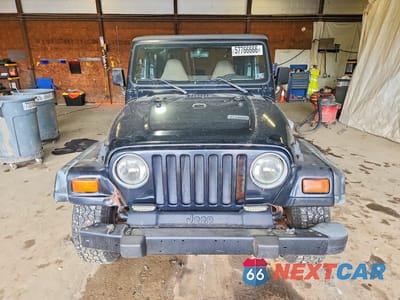 Piąte zdjęcie samochodu w środku: 1999 JEEP WRANGLER / TJ SE VIN:1J4FY29P3XP466242 - miniatura