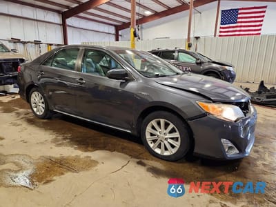 Czwarte zdjęcie samochodu z boku: 2012 TOYOTA CAMRY HYBRID XLE VIN:4T1BD1FK9CU052599 - miniatura