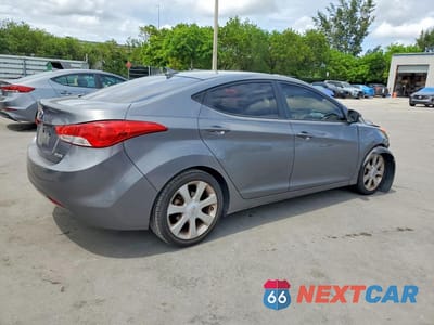 Trzecie zdjęcie samochodu z tyłu: 2012 HYUNDAI ELANTRA LIMITED VIN:5NPDH4AE3CH111385 - miniatura
