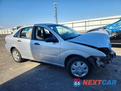 Czwarte zdjęcie samochodu z boku: 2007 FORD FOCUS ZX4 VIN:1FAHP34N27W221246 - miniatura