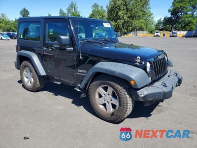 Czwarte zdjęcie samochodu z boku: 2014 JEEP WRANGLER SPORT VIN:1C4AJWAG1EL100808 - miniatura