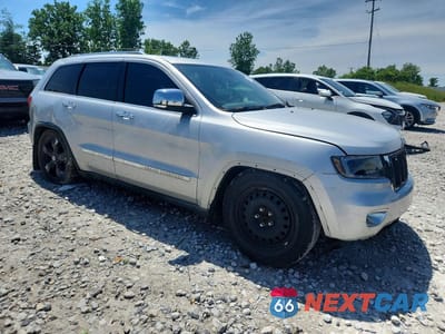 Czwarte zdjęcie samochodu z boku: 2012 JEEP GRAND CHEROKEE OVERLAND VIN:1C4RJFCG8CC114881 - miniatura