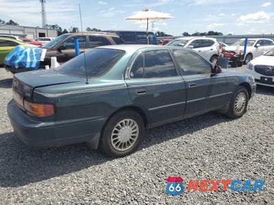Trzecie zdjęcie samochodu z tyłu: 1993 TOYOTA CAMRY XLE VIN:4T1SK13E9PU248682 - miniatura