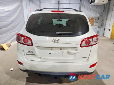 Zdjęcie 6 z 13 samochodu: 2012 HYUNDAI SANTA FE VIN:5XYZGDAB0CG119479 - miniatura