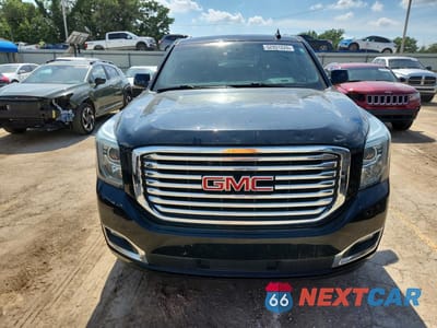 Piąte zdjęcie samochodu w środku: 2018 GMC YUKON SLT VIN:1GKS2BKC4JR318520 - miniatura