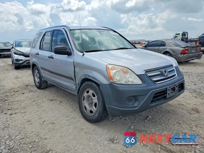 Czwarte zdjęcie samochodu z boku: 2005 HONDA CR-V LX VIN:JHLRD68565C000768 - miniatura