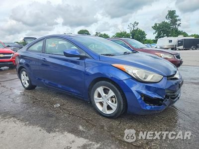 Czwarte zdjęcie samochodu z boku: 2013 HYUNDAI ELANTRA COUPE GS VIN:KMHDH6AE2DU006979 - miniatura