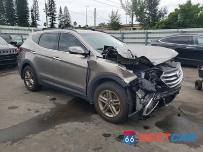 Czwarte zdjęcie samochodu z boku: 2018 HYUNDAI SANTA FE SPORT 2.4L VIN:5NMZU3LB5JH105547 - miniatura