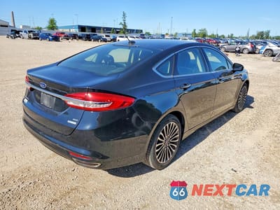 Trzecie zdjęcie samochodu z tyłu: 2017 FORD FUSION SE VIN:3FA6P0H9XHR284313 - miniatura