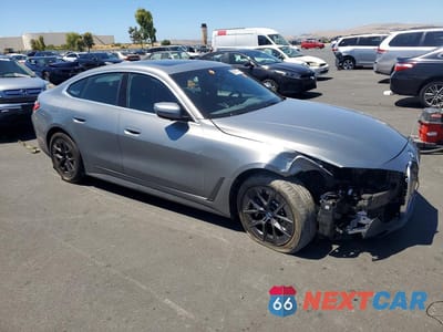 Czwarte zdjęcie samochodu z boku: 2024 BMW I4 EDRIVE 35 VIN:WBY43AW04RFS55409 - miniatura