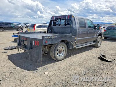 Czwarte zdjęcie samochodu z boku: 2013 FORD F350 SUPER DUTY VIN:1FT8W3BT8DEB26674 - miniatura