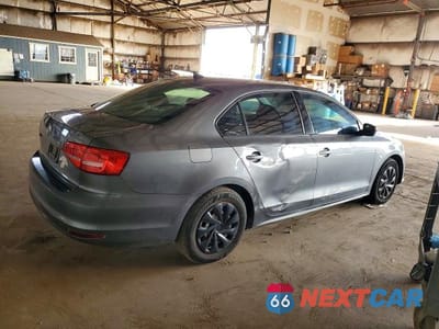 Trzecie zdjęcie samochodu z tyłu: 2015 VOLKSWAGEN JETTA BASE VIN:3VW1K7AJ2FM427584 - miniatura