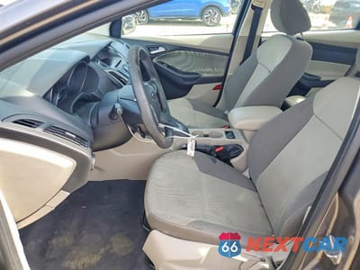 Zdjęcie 7 z 12 samochodu: 2014 FORD FOCUS SE VIN:1FADP3F20EL251233 - miniatura