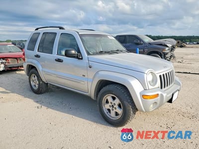 Czwarte zdjęcie samochodu z boku: 2003 JEEP LIBERTY LIMITED VIN:1J4GL58K63W688557 - miniatura