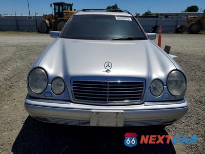 Piąte zdjęcie samochodu w środku: 1999 MERCEDES-BENZ E 320 4MATIC VIN:WDBJH82F9XX013987 - miniatura
