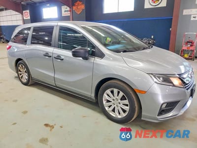 Czwarte zdjęcie samochodu z boku: 2018 HONDA ODYSSEY LX VIN:5FNRL6H26JB100064 - miniatura