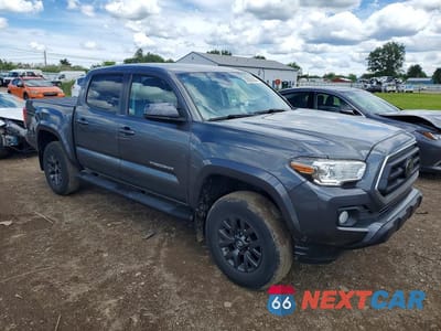 Czwarte zdjęcie samochodu z boku: 2021 TOYOTA TACOMA SR5 V6 VIN:3TMCZ5AN3MM411180 - miniatura