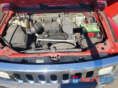 Zdjęcie 12 z 13 samochodu: 2006 HUMMER H3 VIN:5GTDN136768141109 - miniatura