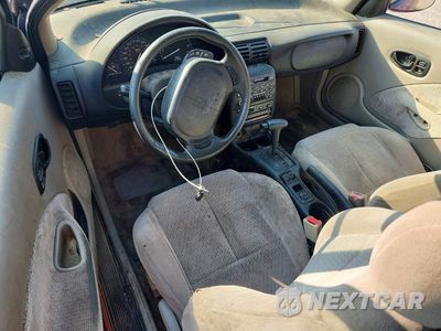 Zdjęcie 8 z 12 samochodu: 1999 SATURN SC2 VIN:1G8ZH1277XZ155256 - miniatura